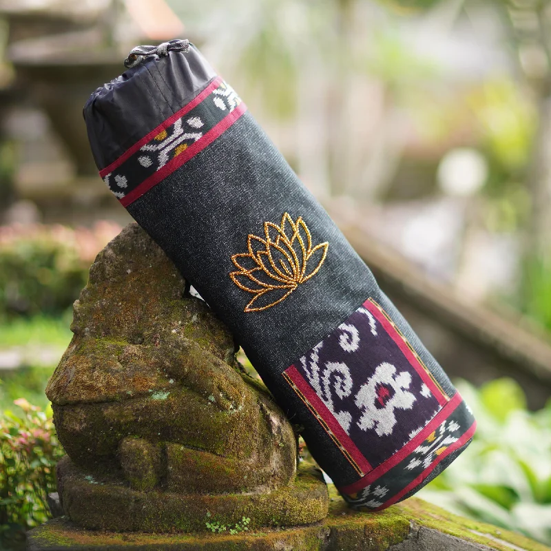 Weekend Specials to Snag Lotus Lagoon in Black Ikat Cotton Yoga Mat Bag with Glass Bead Motif Weekend Specials to Snag Lotus Lagoon in Black Ikat Cotton Yoga Mat Bag with Glass Bead Motif